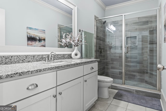 bathroom with toilet, crown molding, tile patterned floors, a shower with door, and vanity