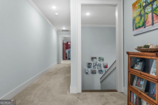 corridor with light carpet and ornamental molding