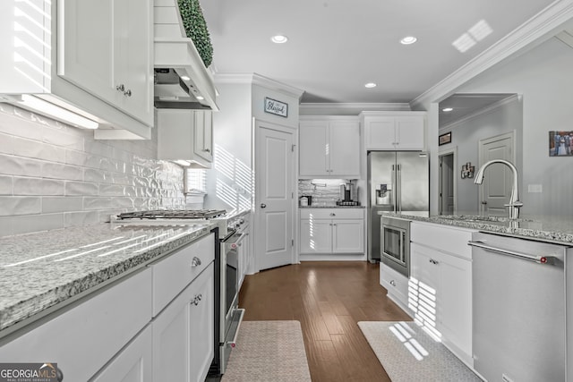 kitchen with custom exhaust hood, light stone countertops, dark hardwood / wood-style flooring, and high quality appliances