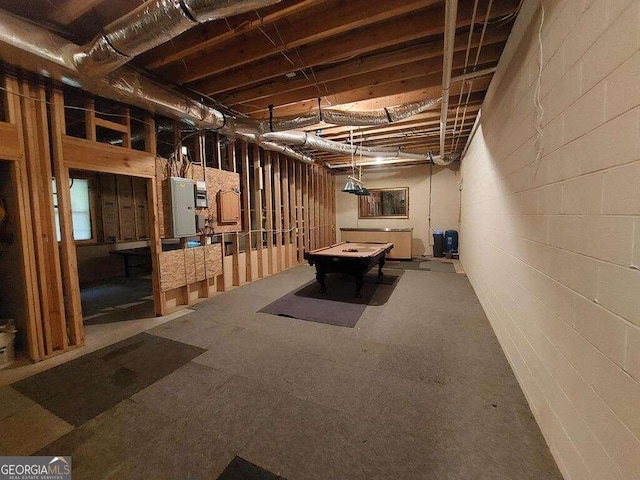 basement featuring electric panel and pool table