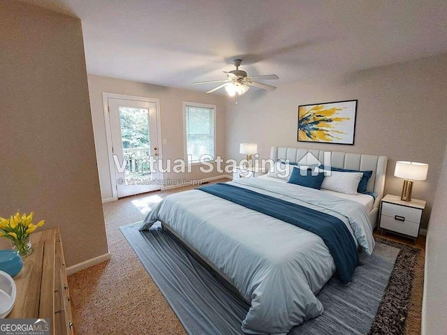 carpeted bedroom featuring access to outside and ceiling fan