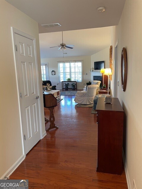 hall featuring dark hardwood / wood-style flooring