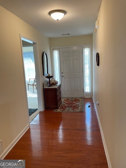 entryway featuring dark hardwood / wood-style floors