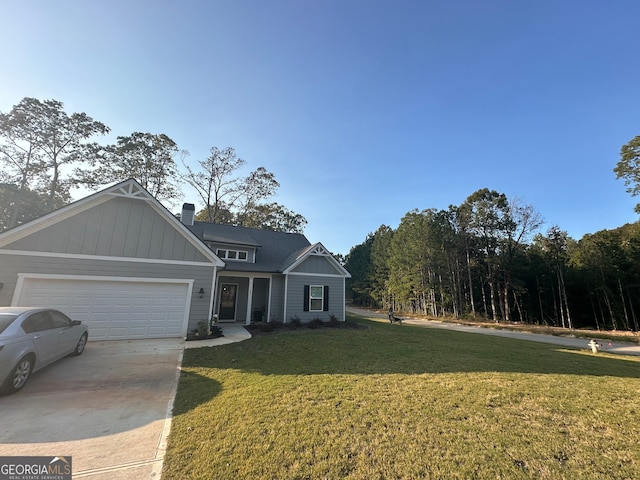 view of front facade featuring a front yard and a garage