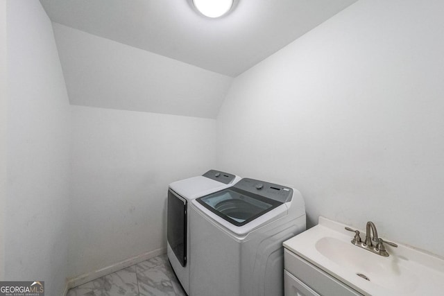 laundry room featuring separate washer and dryer and sink