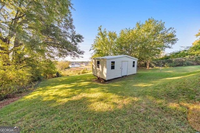 view of yard with a storage shed