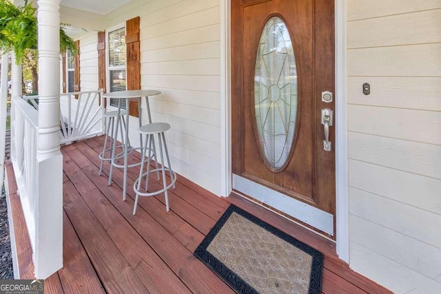 entrance to property with covered porch