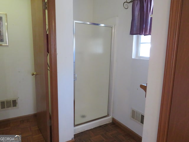 402 Thurman Rd, Stockbridge, GA 30281 - full bathroom featuring a shower stall and baseboards
