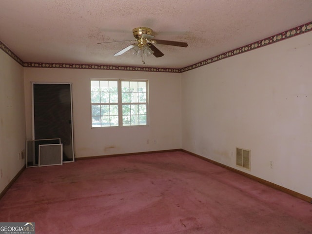 402 Thurman Rd, Stockbridge, GA 30281 - carpeted spare room featuring baseboards, ceiling fan, and a textured ceiling