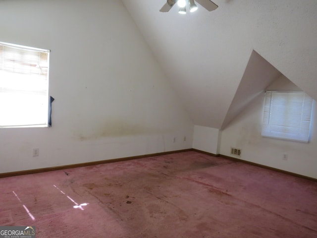402 Thurman Rd, Stockbridge, GA 30281 - bonus room with lofted ceiling, carpet, a ceiling fan, and baseboards