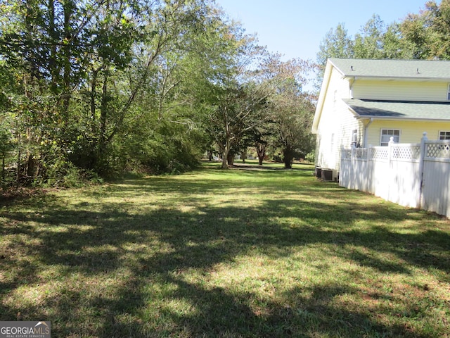 402 Thurman Rd, Stockbridge, GA 30281 - view of yard featuring central AC unit