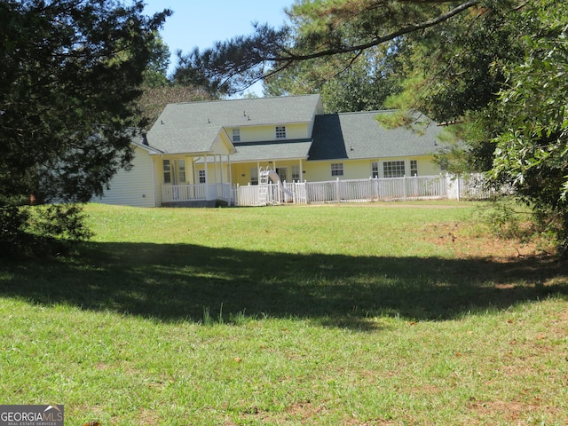 402 Thurman Rd, Stockbridge, GA 30281 - view of green lawn featuring covered porch