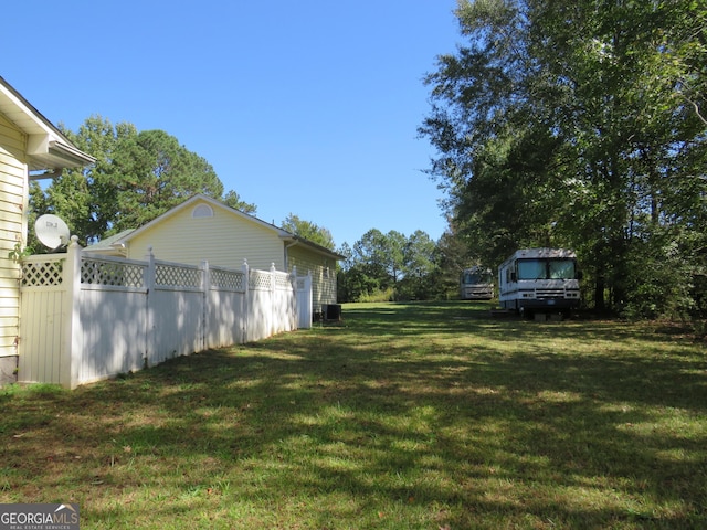 402 Thurman Rd, Stockbridge, GA 30281 - view of yard featuring central AC