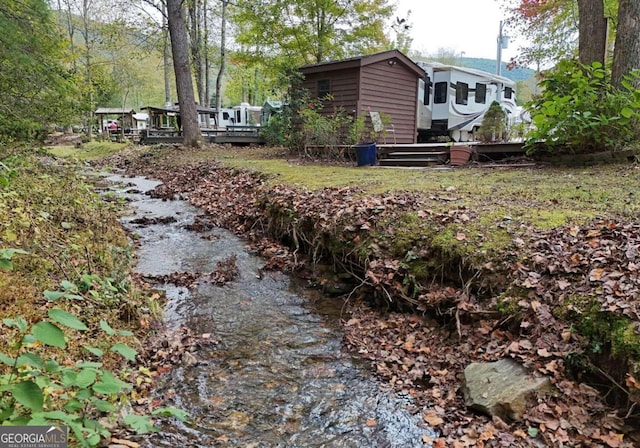 view of yard with a deck