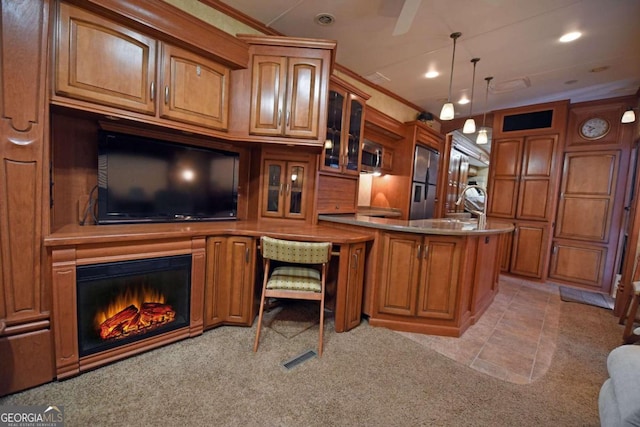 carpeted office space featuring crown molding and sink