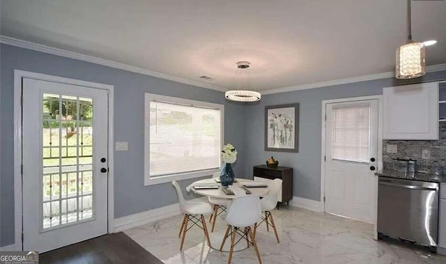 dining space featuring ornamental molding