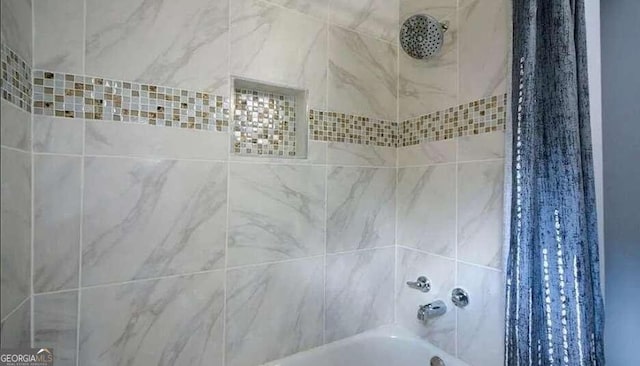 bathroom with shower / bath combo