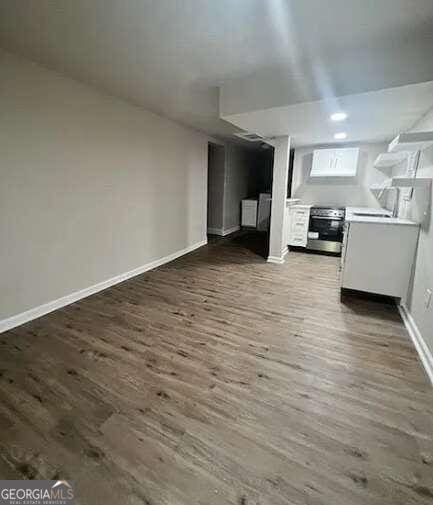 interior space with dark hardwood / wood-style floors