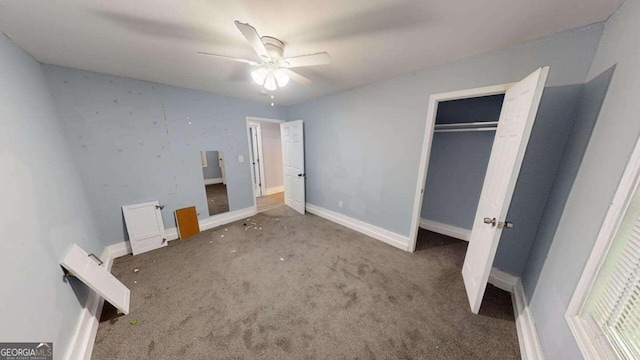 unfurnished bedroom with carpet floors, a closet, and ceiling fan