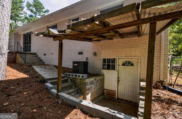 exterior space featuring a pergola and central air condition unit