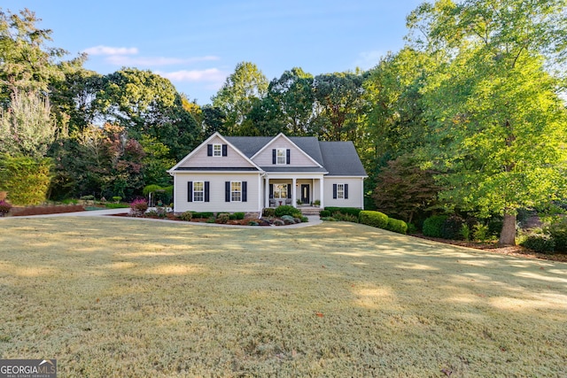 view of front of home featuring a front lawn and a porch