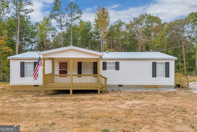 manufactured / mobile home featuring covered porch