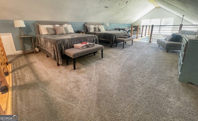 bedroom with lofted ceiling and carpet flooring