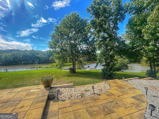 view of patio / terrace featuring a water view