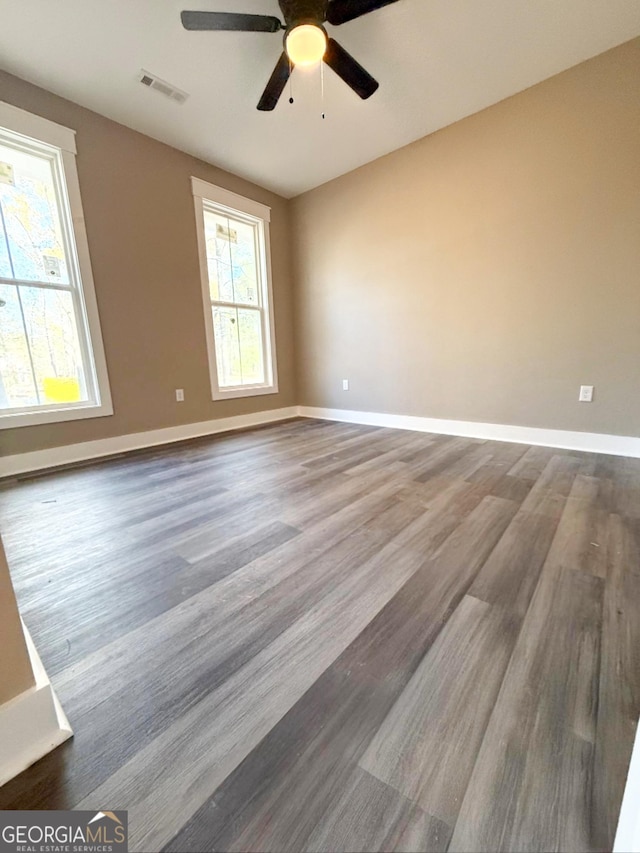 unfurnished room featuring wood-type flooring and ceiling fan