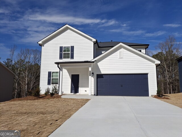 view of front property with a garage