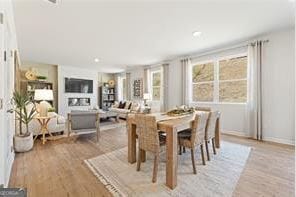 dining room with light wood-type flooring