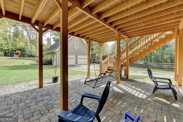 view of property exterior featuring a garage and a yard