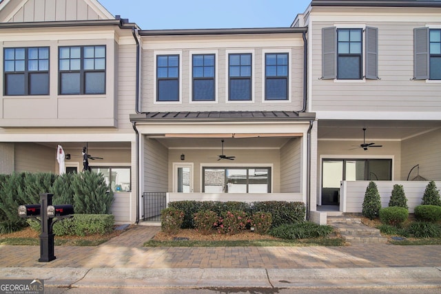 townhome / multi-family property with ceiling fan