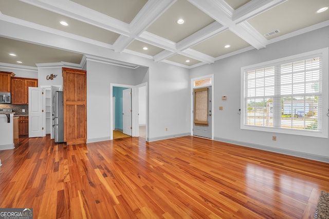 unfurnished living room with ornamental molding, beamed ceiling, coffered ceiling, and hardwood / wood-style flooring