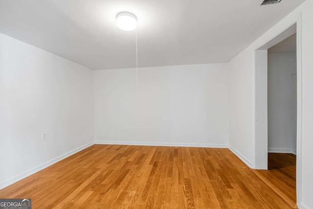 additional living space featuring light hardwood / wood-style floors