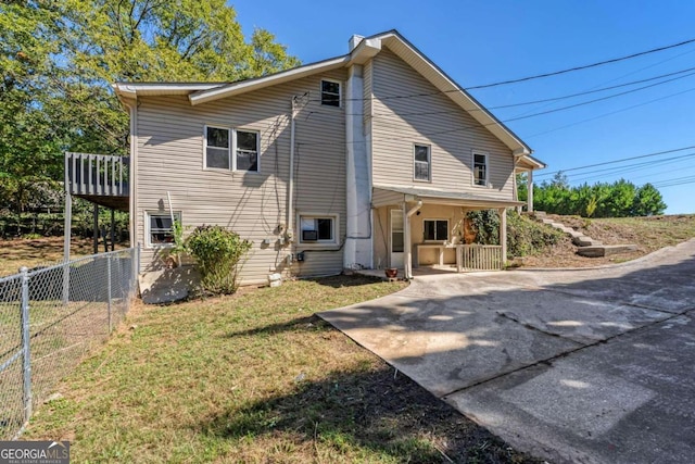 view of property exterior with a yard