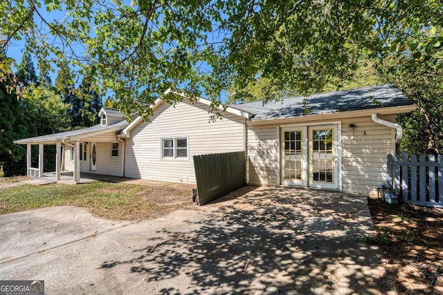 rear view of property featuring a patio