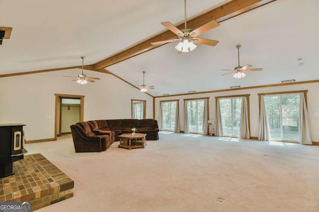 carpeted living room featuring a wood stove, high vaulted ceiling, beamed ceiling, and ornamental molding