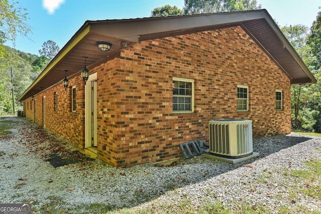 view of home's exterior with central air condition unit