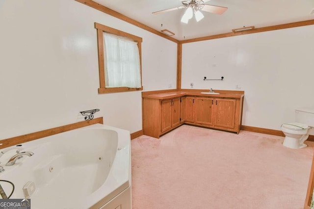 bathroom with ceiling fan, sink, toilet, and a washtub