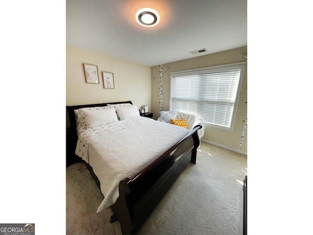 bedroom featuring carpet flooring