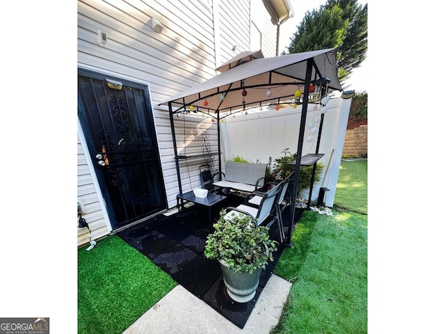 view of patio / terrace with a gazebo