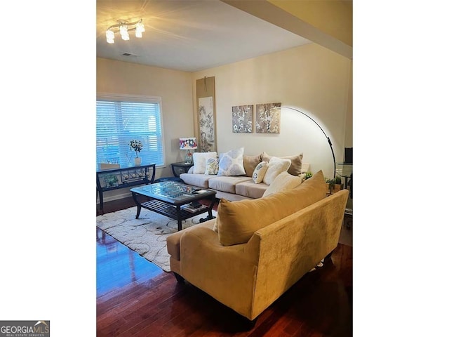 living room with dark wood-type flooring