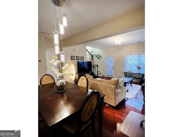 dining area featuring dark hardwood / wood-style flooring