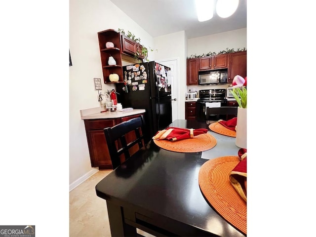 kitchen with black appliances