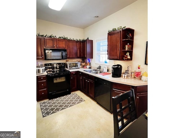 kitchen with black appliances and sink