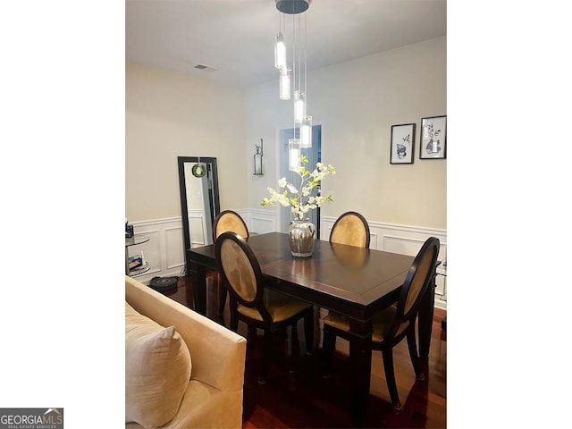 dining room featuring dark wood-type flooring