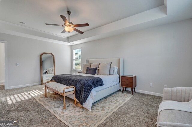 22 Allston Ln, Savannah, GA 31407 - carpeted bedroom with crown molding, baseboards, ceiling fan, and a raised ceiling