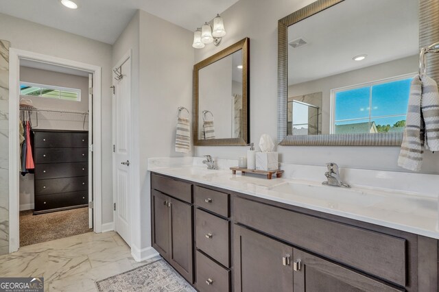 22 Allston Ln, Savannah, GA 31407 - bathroom featuring double vanity, visible vents, a shower with shower door, a sink, and marble finish floor