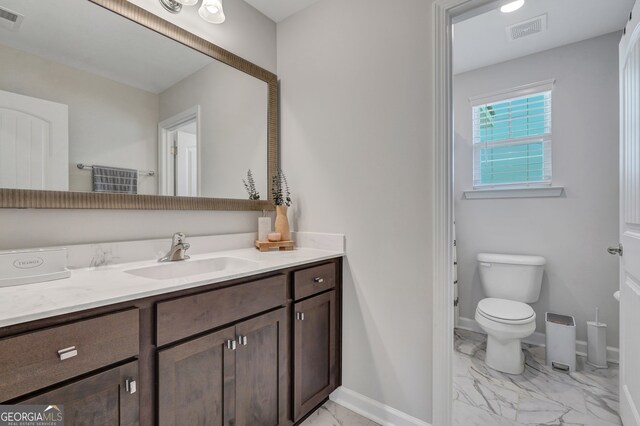 22 Allston Ln, Savannah, GA 31407 - bathroom featuring visible vents, marble finish floor, toilet, and vanity
